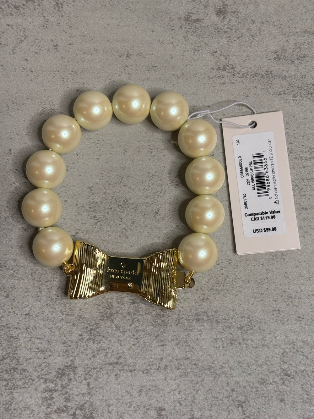 Kate Spade All Wrapped Up Faux Pearl Bracelet with Gold Bow Closure - Picture 5 of 10